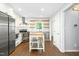 Charming kitchen featuring stainless steel appliances, wooden countertops, a kitchen island, and ample storage at 6912 Baywood Dr, Raleigh, NC 27613