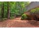 Beautiful backyard with deck, storage shed, privacy fence and lovely green trees at 7 Hitching Rack Ct, Durham, NC 27713