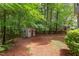 Backyard with a storage shed and privacy fence at 7 Hitching Rack Ct, Durham, NC 27713