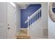 Entry way with staircase and accent wall at 7 Hitching Rack Ct, Durham, NC 27713