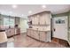 Cozy kitchen with stainless steel appliances, modern cabinetry and a view to the outside at 750 Greenleaf Rd, Angier, NC 27501