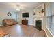 Cozy living room featuring a fireplace and hardwood floors at 750 Raymond Dr, Clayton, NC 27527