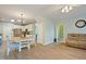 Open living space with eat-in kitchen, hardwood floors, and modern appliances at 750 Raymond Dr, Clayton, NC 27527
