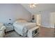 Bright main bedroom with vaulted ceiling, exercise bike, and sleek furnishings at 750 Raymond Dr, Clayton, NC 27527