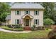 Charming two-story home with a well-manicured front yard at 7520 Milestone Ct, Raleigh, NC 27615