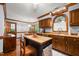 Charming kitchen featuring a center island and breakfast nook at 7520 Milestone Ct, Raleigh, NC 27615