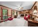 Spacious living room with brick fireplace and views of the backyard at 7520 Milestone Ct, Raleigh, NC 27615