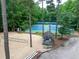 Recreational area featuring tennis courts, a volleyball court, and a quaint outdoor lounge at 7520 Milestone Ct, Raleigh, NC 27615