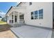 Beautiful exterior patio with a screened porch, perfect for outdoor gatherings and relaxing in style at 7719 Barefoot Rd, Fuquay Varina, NC 27526