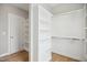 Spacious walk-in closet with built-in shelving on multiple walls offering plentiful storage at 7719 Barefoot Rd, Fuquay Varina, NC 27526