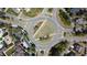 Overhead view of the community roundabout, showcasing the layout of the streets and surrounding homes and amenities at 78 Salt Cedar Ln, Chapel Hill, NC 27516