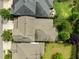 Aerial backyard with a stone patio, beautiful lawn, and nice landscaping at 78 Salt Cedar Ln, Chapel Hill, NC 27516