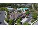 Aerial view of the community clubhouse and pool area, showing the various amenities available to residents at 78 Salt Cedar Ln, Chapel Hill, NC 27516
