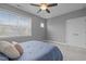 Neutral bedroom with a large window and plush carpeting at 78 Salt Cedar Ln, Chapel Hill, NC 27516