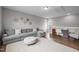 Comfortable bonus room with seating and desk at 78 Salt Cedar Ln, Chapel Hill, NC 27516