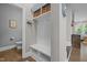 Mudroom foyer with bench and hall bathroom at 78 Salt Cedar Ln, Chapel Hill, NC 27516