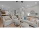 Bright and airy living room featuring neutral tones, recessed lighting, and a cozy seating arrangement at 78 Salt Cedar Ln, Chapel Hill, NC 27516