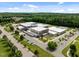 Aerial view of a school facility with parking, academic buildings, and green space at 78 Salt Cedar Ln, Chapel Hill, NC 27516