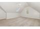 Attic bedroom with skylight and carpet at 7936 Milltrace, Raleigh, NC 27615