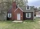 Charming home featuring brick accents, inviting entrance, and curb appeal that exudes character at 0 Chapel Hill Rd, Durham, NC 27707