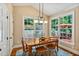 Dining room features natural light, vaulted ceiling, and an outdoor view at 101 Collinson Dr, Chapel Hill, NC 27514
