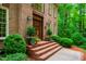Charming brick home with a welcoming front entrance and landscaped garden at 101 Collinson Dr, Chapel Hill, NC 27514
