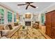 Cozy living space features a fireplace, built-in bookshelves, and plenty of natural light at 101 Collinson Dr, Chapel Hill, NC 27514