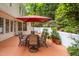 Inviting patio with a dining set and lush greenery, perfect for outdoor entertaining at 101 Collinson Dr, Chapel Hill, NC 27514