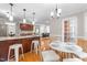 Open kitchen and breakfast nook, perfect for casual dining and entertaining in a naturally lit space at 106 Ridgepath Way, Cary, NC 27511