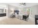 Comfortable main bedroom with a ceiling fan, neutral carpet, and bright bay windows overlooking the yard at 106 Ridgepath Way, Cary, NC 27511
