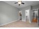 Bedroom featuring neutral walls, light wood flooring, and a walk-in closet at 109 Henrys Ridge Rd, Pittsboro, NC 27312