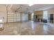 Spacious three car garage with work area and bright lighting perfect for a workshop or car collection at 109 Henrys Ridge Rd, Pittsboro, NC 27312