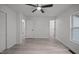 Bright bedroom with neutral walls and flooring and doorway to an ensuite bathroom at 111 S Gaylee Lake Dr, Wendell, NC 27591