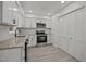 Bright kitchen with white cabinets, granite countertops, and stainless steel appliances at 111 S Gaylee Lake Dr, Wendell, NC 27591