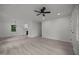 Spacious living room with hardwood floors and kitchen access at 111 S Gaylee Lake Dr, Wendell, NC 27591