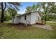 Rear exterior of home with level backyard and side deck at 111 S Gaylee Lake Dr, Wendell, NC 27591
