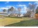 Fenced-in backyard featuring lush green grass at 11113 N Radner Way, Raleigh, NC 27613