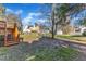 Spacious backyard featuring a deck, grass, and mature trees at 11113 N Radner Way, Raleigh, NC 27613