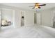 Bedroom with closet, walk-in closet, and neutral color palette at 113 Bergeron Way, Cary, NC 27519