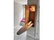 Built-in ironing board, window seat nook, and gray walls at 113 Bergeron Way, Cary, NC 27519