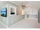 Large bonus room with built-in shelves, carpet, and vaulted ceilings at 113 Bergeron Way, Cary, NC 27519
