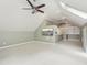 Large, carpeted bonus room with vaulted ceilings and plenty of built in storage at 113 Bergeron Way, Cary, NC 27519