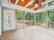 Covered outdoor porch with views of the surrounding trees at 113 Bergeron Way, Cary, NC 27519