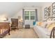 Bedroom setup with a daybed, desk, and study area at 114 Margaret Mann Way, Pittsboro, NC 27312