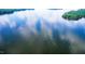 Gorgeous lake view featuring a boat leaving a wake at 114 Margaret Mann Way, Pittsboro, NC 27312