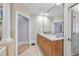 Bathroom featuring a large mirror over the vanity and adjacent doorways at 1300 Heritage Club Ave, Wake Forest, NC 27587