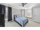 Comfortable bedroom with window seat, carpet, and light blue bedding set at 1300 Heritage Club Ave, Wake Forest, NC 27587
