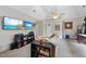 Spacious bonus room with large screen TVs, neutral carpet, and high vaulted ceilings at 1300 Heritage Club Ave, Wake Forest, NC 27587