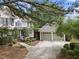 Well-maintained two-story home and detached two-car garage on manicured lot at 1300 Heritage Club Ave, Wake Forest, NC 27587