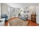 Charming home office featuring a cozy seating area, desk, and natural light at 1300 Heritage Club Ave, Wake Forest, NC 27587